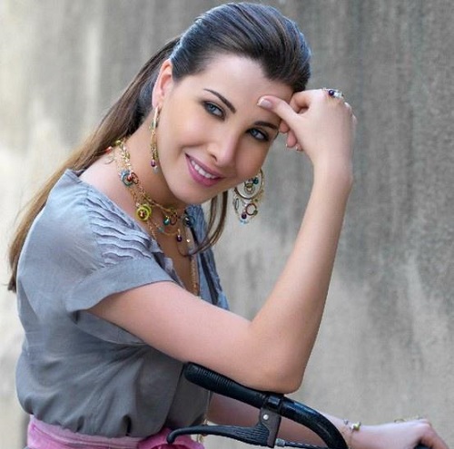 بیوگرافی و عکس های خواننده عرب "نانسی عجرم"